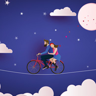 Paar auf einem Fahrrad bei Nacht